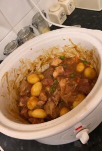 This Slow Cooker Beef Casserole is packed with tender beef chunks, baby new potatoes, green beans and peas, all simmered in a rich, savoury gravy. A simple, no-fuss family dinner that's ready when you are. Ingredients 800g (1¾ lb) stewing beef, cut into chunks 1 tbsp vegetable oil 1 large onion, chopped 2 garlic cloves, minced 500g (1 lb) baby new potatoes, halved 2 carrots, sliced 100g (¾ cup) green beans, trimmed 2 tbsp plain flour 600ml (2½ cups) beef stock 1 tbsp Worcestershire sauce 1 tbsp tomato purée 1 tsp dried thyme 1 bay leaf Salt and black pepper, to taste 100g (¾ cup) frozen peas Slow Cooker Beef Casserole: Instructions Warm the oil in a pan over medium-high heat. Brown the beef chunks in batches for 2–3 minutes per side, then transfer to the slow cooker. This step is optional but adds extra flavour. Put the onion and garlic into the pan. Cook them for 2 to 3 minutes until they become soft. Add the onion and garlic to the slow cooker along with the baby new potatoes, carrots, and green beans. Add the flour to the beef and vegetables. Stir everything well so the flour covers them. Pour in the beef broth, Worcestershire sauce, and tomato paste. Mix everything together until well combined. Add the dried thyme, bay leaf, salt, and pepper. Cover and cook on low for 7–8 hours, or on high for 4–5 hours, until the beef and potatoes are tender. Stir once or twice during cooking, adding a splash more stock if the casserole looks too thick. Add the frozen peas for the last 15 to 20 minutes so they cook but stay fresh and green. Remove the bay leaf before serving. Taste and adjust the seasoning as needed. Ladle into bowls and serve hot, straight from the pot or with crusty bread. This rich, homely beef casserole is the perfect set-and-forget dinner — packed with tender meat and hearty vegetables in every comforting spoonful. Slow Cooker Beef Casserole Recipe